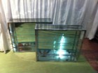 Pair of chromed display cases