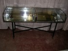 Double flat vitrine, chromed brass and curved glass