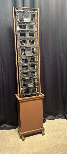 Antique postcard display stand.