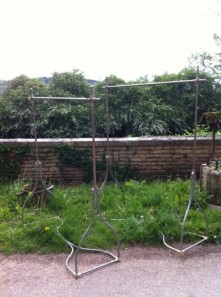Two vintage shop coat racks