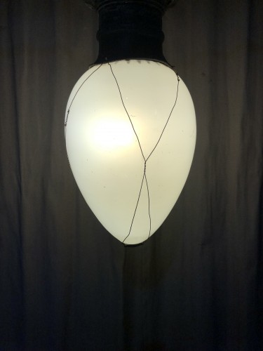 Old hanging lamp, shop lantern.