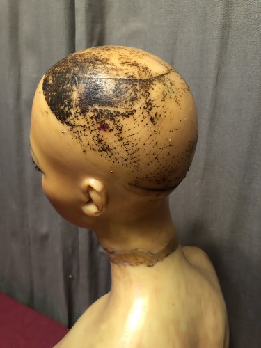 Old wax mannequin bust.