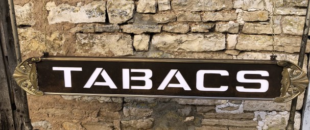 Former indoor tobacco shop sign.