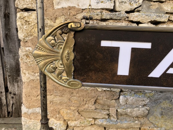 Former indoor tobacco shop sign.
