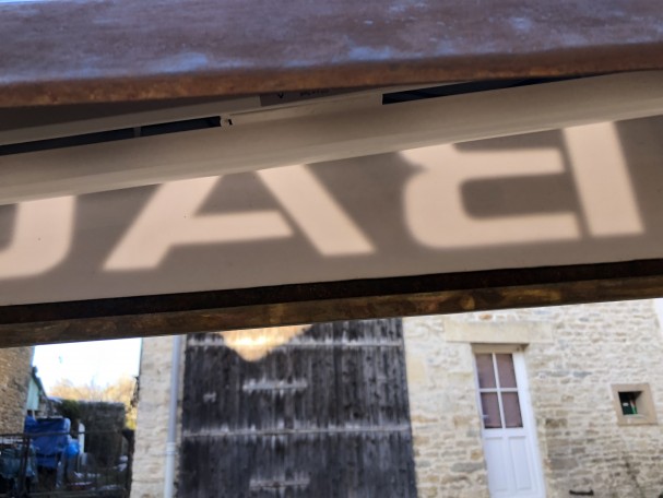 Former indoor tobacco shop sign.