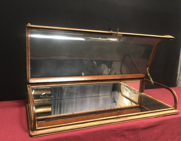 Old curved counter display case.