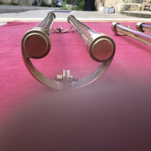 Two old pairs of door handles from a luxury store