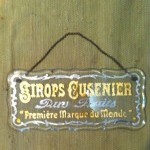 Vintage advertising glass plaque