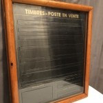 Post office stamp wall display case.
