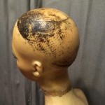 Old wax mannequin bust.