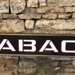 Former indoor tobacco shop sign.