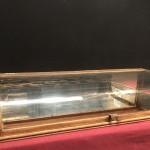 Old curved counter display case.