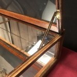 Old curved counter display case.