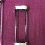 Two old pairs of door handles from a luxury store