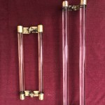 Two old pairs of door handles from a luxury store