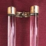 Two old pairs of door handles from a luxury store