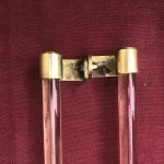 Two old pairs of door handles from a luxury store