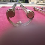 Two old pairs of door handles from a luxury store