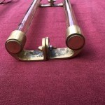 Two old pairs of door handles from a luxury store