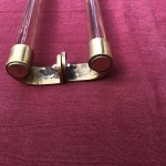 Two old pairs of door handles from a luxury store