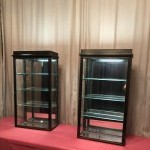 Pair of antique shop wall display cases.