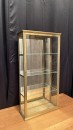 Small antique wall-mounted display case.
