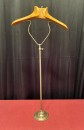 Vintage shop window clothing display stand.