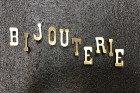Old small letters jewelry store sign.(sold)
