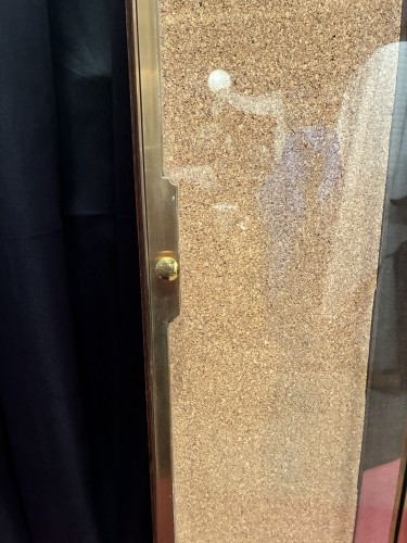 Pair of antique wall-mounted jewelry display cases.