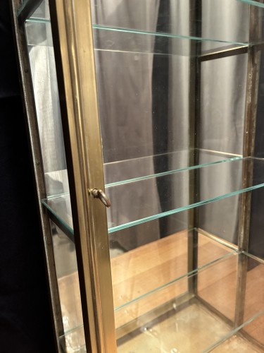 Small antique wall-mounted display case.
