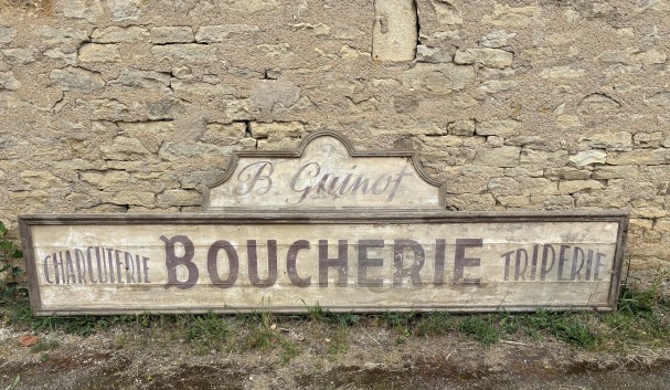 Former large shopfront sign.