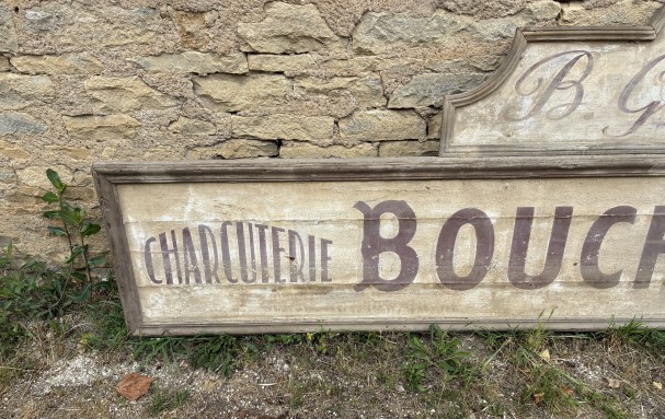 Former large shopfront sign.