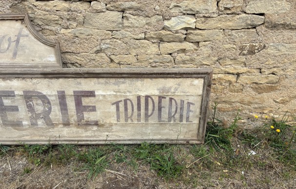 Former large shopfront sign.