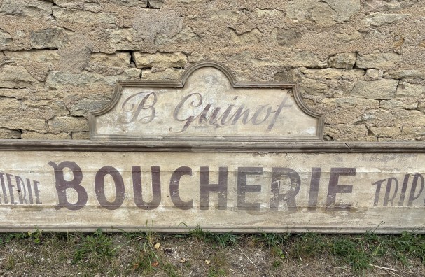 Former large shopfront sign.