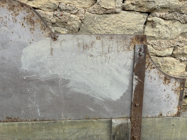 Former large shopfront sign.
