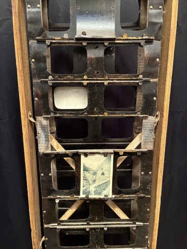 Vintage postcard display stand.