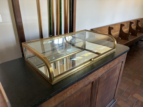 Antique shop counter display case.