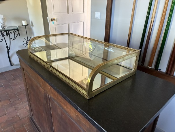 Antique shop counter display case.