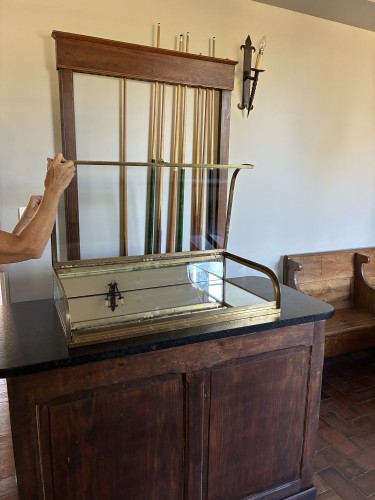 Antique shop counter display case.