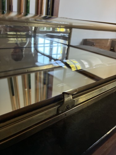 Antique shop counter display case.