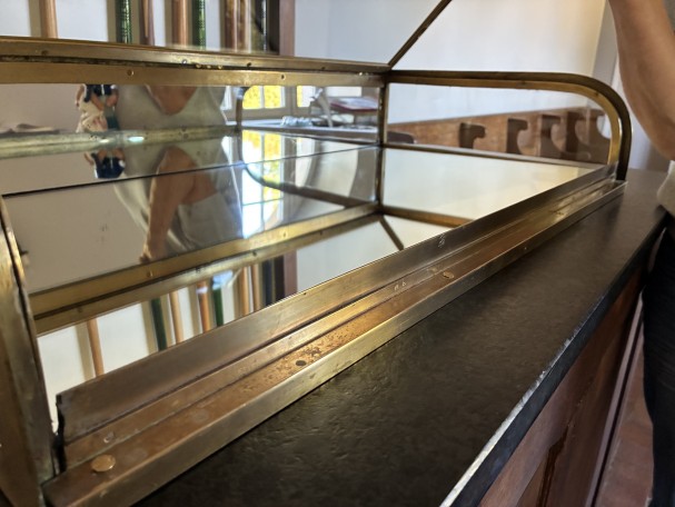 Antique shop counter display case.