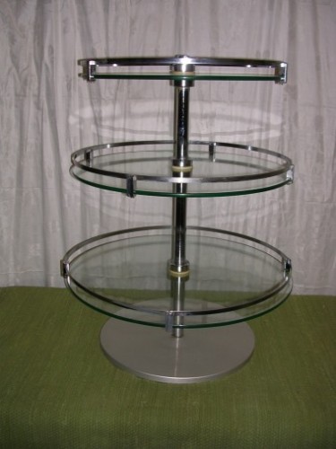 3 circular glass trays display
