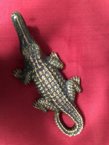 Old large earthenware crocodile.