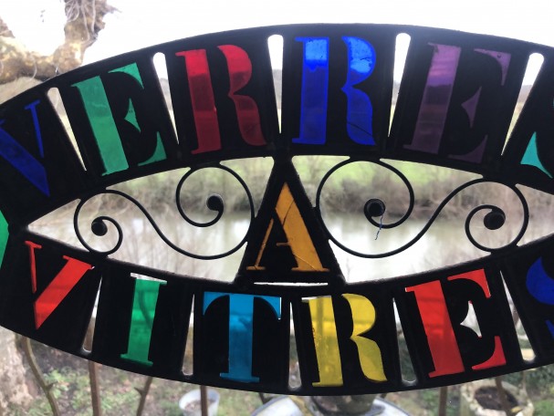 Old glazier's sign, stained glass maker.