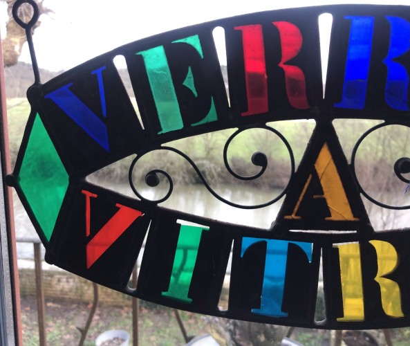 Old glazier's sign, stained glass maker.