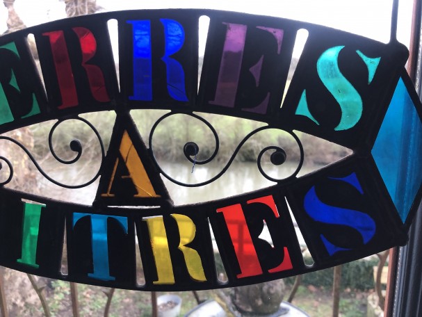 Old glazier's sign, stained glass maker.