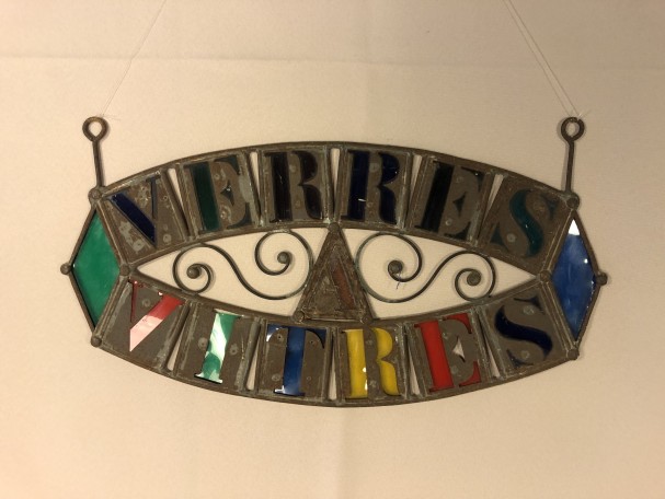 Old glazier's sign, stained glass maker.