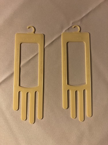 Pair of glove displays.