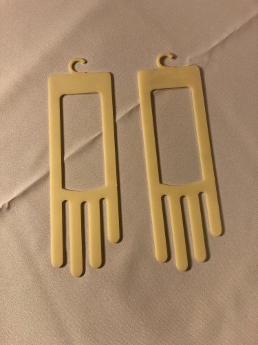 Pair of glove displays.