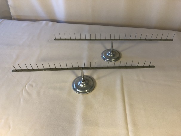 Pair of antique store display stands.